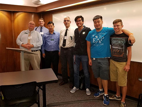 Dr. Bekkering, Dr. Xiong, Mr. Rice and Dr. Reif with students at conference