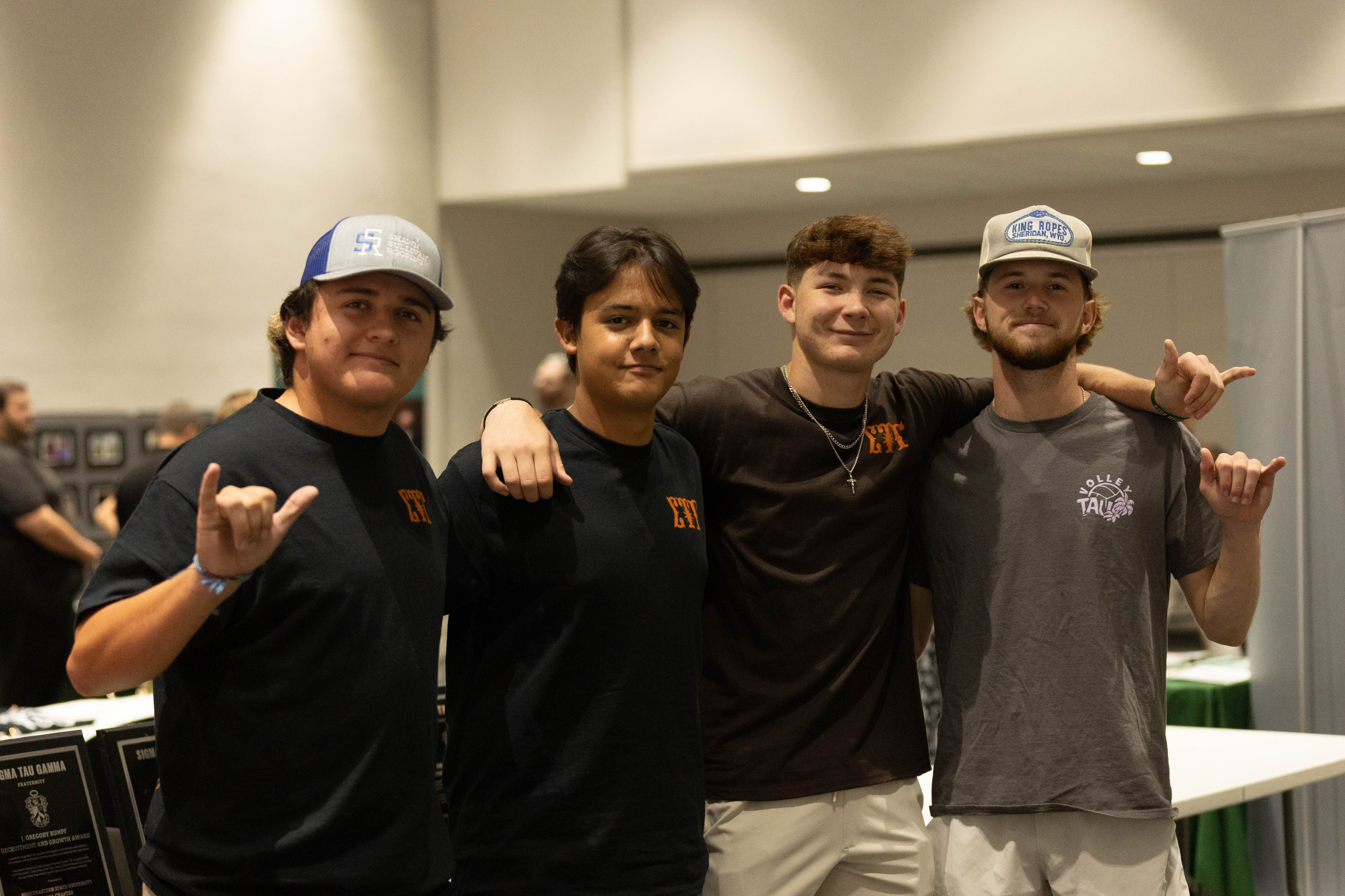 Riverhawk Rally 24 4 guys standing together