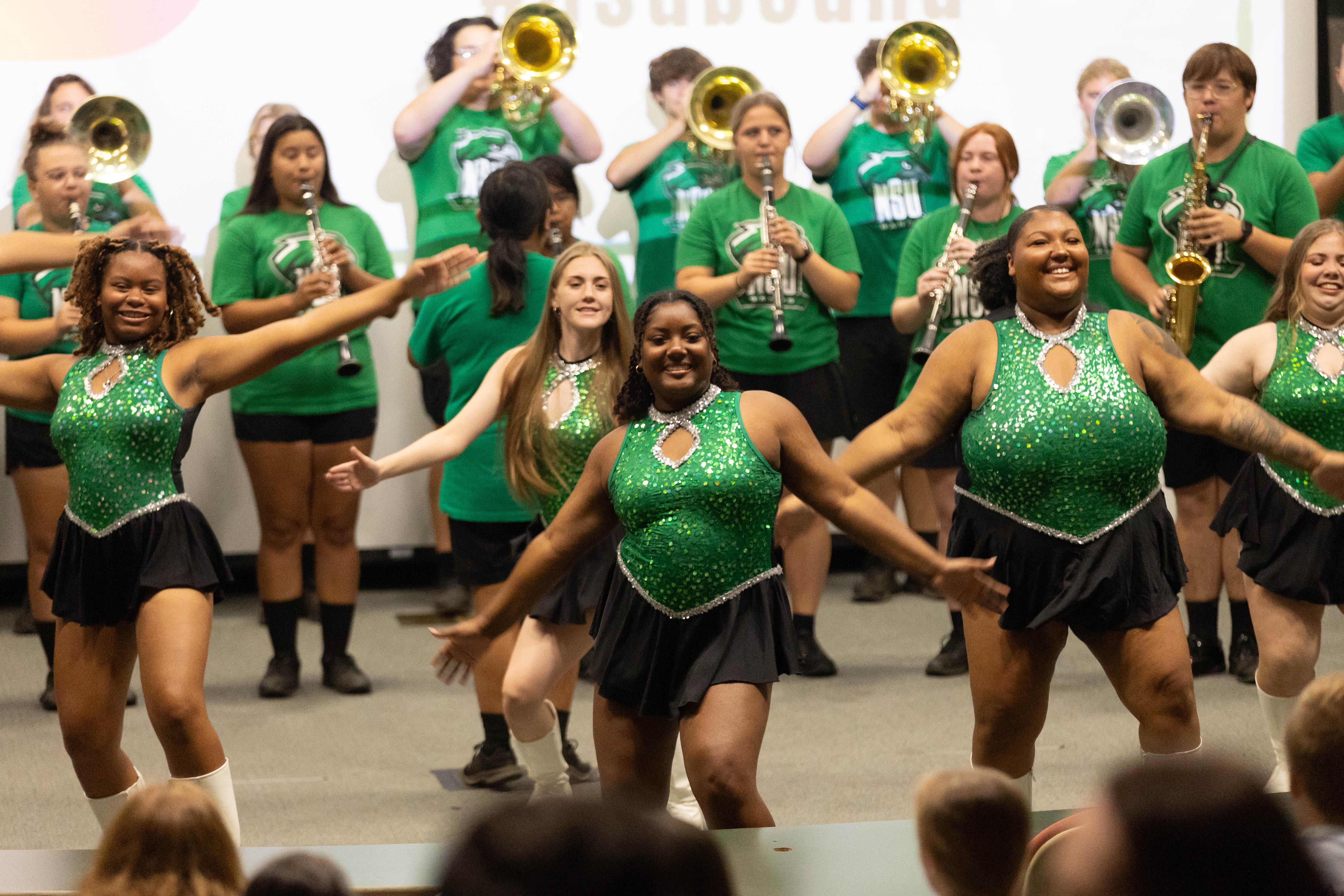 Riverhawk rally 24 Sassy hawks and band performing