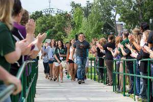 Freshmen students participating in the Coin Walk 